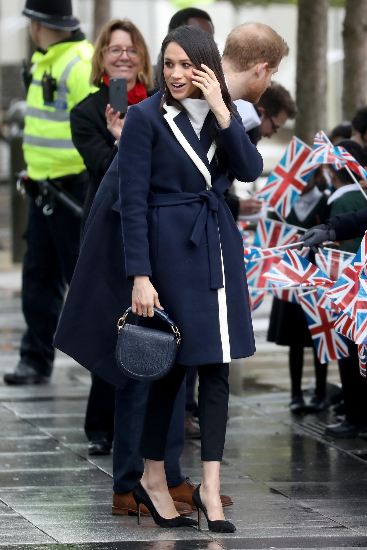 Markle visited Birmingham, England, in a J.Crew coat. (Photo: Chris Jackson/Getty Images)