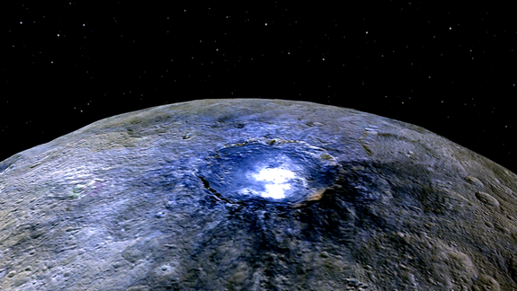 NASA's Dawn spacecraft captured this amazing of Ceres in the asteroid belt, showing the dwarf planet's Occator Crater in false-color. Dawn arrived in orbit around Ceres in March 2015.