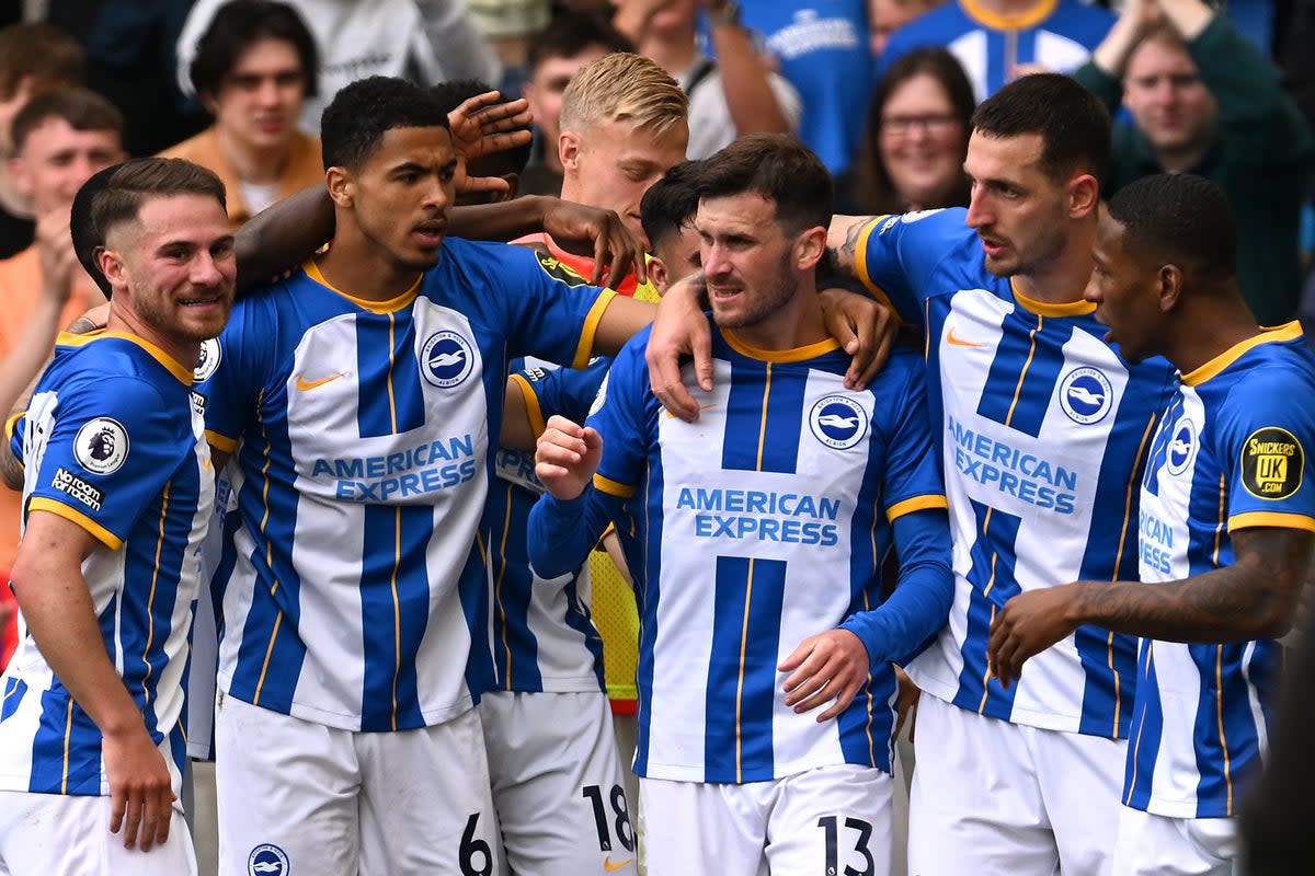 Brighton players celebrate scoring a goal at a home match against Southampton on May 21, 2023 (Getty Images)