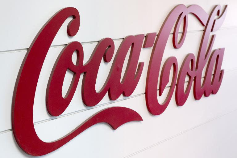 Key global football sponsor Coca-Cola urged FIFA to urgently regain public trust, after the football governing body's president Sepp Blatter resigned under a corruption cloud