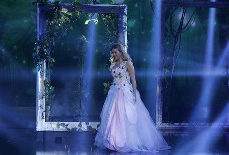 Contestant Jennifer Grout walks on the stage during the Season 3 finale of "Arabs Got Talent" in Zouk Mosbeh area, north of Beirut December 7, 2013. REUTERS/Mohammed Azakir