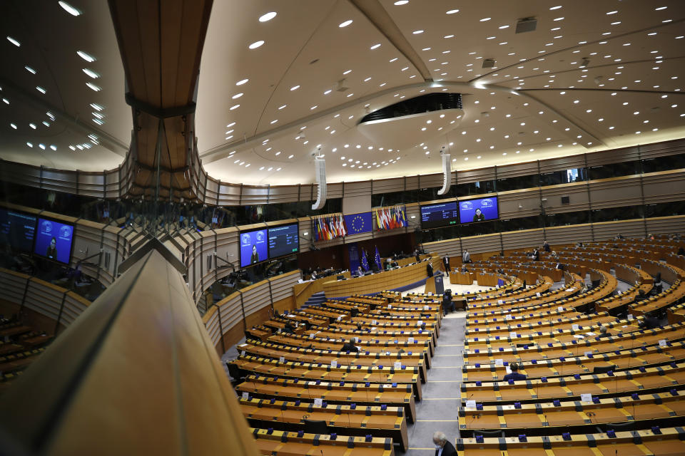 European lawmakers take part in a debate on EU strategy towards Israel and Palestines at the European Parliament in Brussels, Tuesday, May 18, 2021. The EU has been united in its calls for a ceasefire and the need for a political solution to end the latest conflict, now in its second week, but the nations are divided over how best to help. (AP Photo/Francisco Seco)