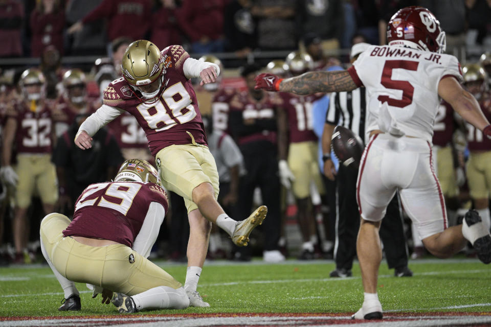 Florida State place-kicker Ryan Fitzgerald (88) hits the go-ahead field goal against Oklahoma during the second half of the Cheez-It Bowl NCAA college football game Thursday, Dec. 29, 2022, in Orlando, Fla. (AP Photo/Phelan M. Ebenhack)