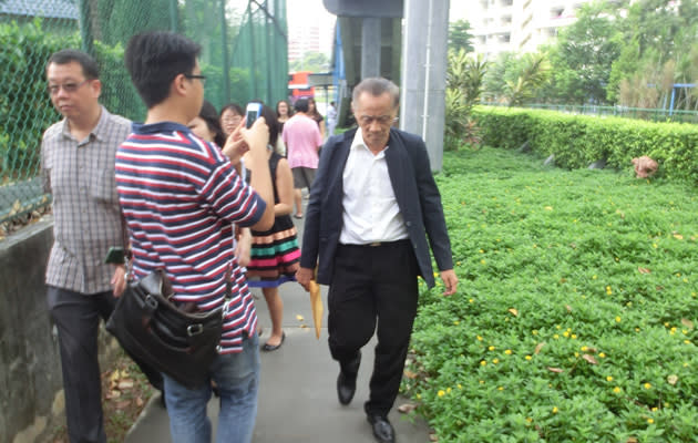 Ooi Boon Ewe circles the neighbouring estates looking for assentors and his driver