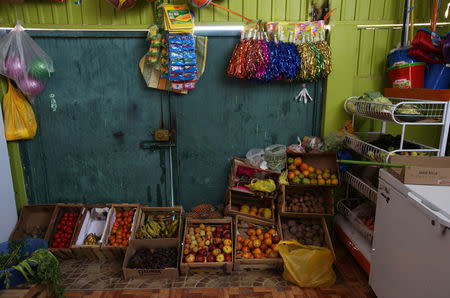 Fruit and vegetables are displayed at a store in the town of Nueva Fuerabamba in Apurimac, Peru, October 3, 2017. REUTERS/Mariana Bazo