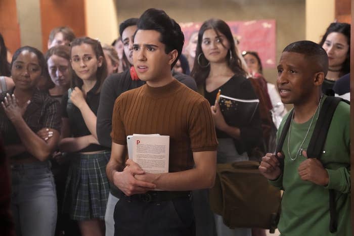 Scene from Saved by the Bell with students standing together in school