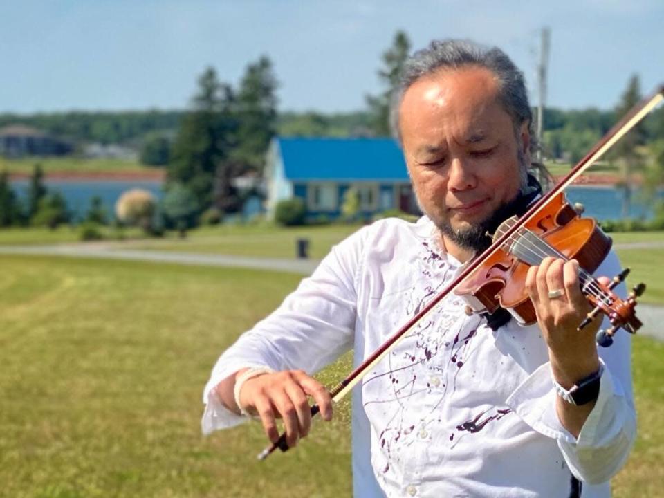 Tzu-Cheng Wang has performed in many famous concert halls around the world over the years. He fell in love with the Island during a trip to P.E.I. (Thinh Nguyen/CBC - image credit)