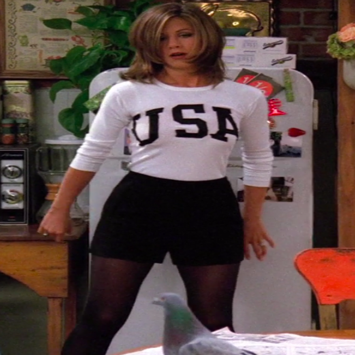 Rachel wearing booties, tights, shorts, and a USA long-sleeve shirt