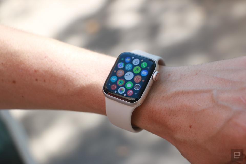 The Apple Watch SE (2022) on a person&#39;s wrist, showing the apps gallery.