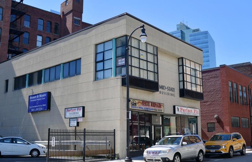 The Mid-State Building on 37 Mechanic St. in Worcester has been sold, forcing longtime tenants and respective owners of Perfect Fit Tailoring and Central Shoe Repair to decide whether they will relocate or retire.