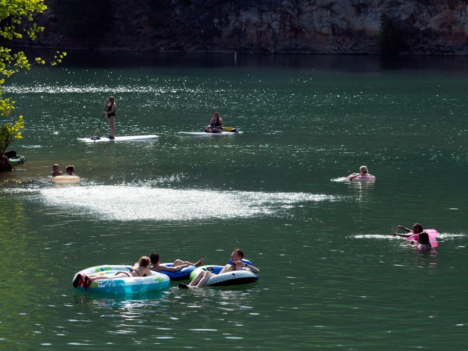 Swimmers and paddleboarders enjoy Mead's Quarry on Sunday, May 26, 2019.