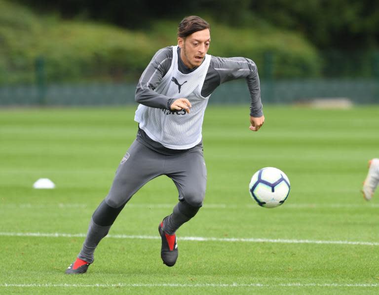 Arsenal star Mesut Ozil back in training after illness