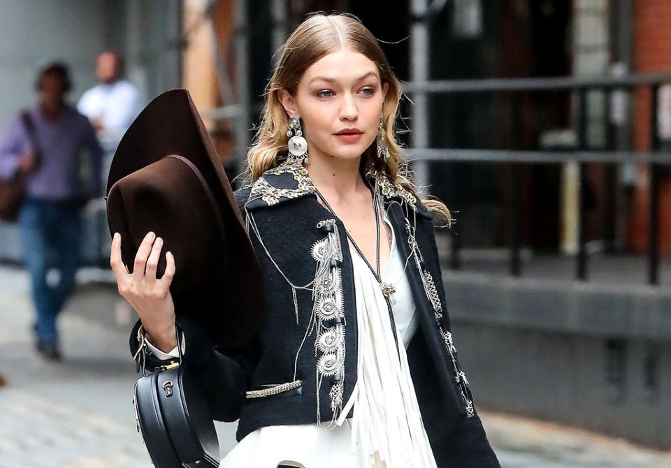 Gigi Hadid Gigi Hadid out and about, New York, USA - 01 Jun 2018Gigi Hadid on set as a cowgirl WEARING LOUIS VUITTON SAME OUTFIT AS CATWALK MODEL *9444759e BOOTS BY FENDI