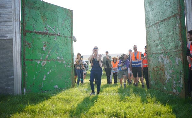 Emily Eavis opens the gates on the first day of the Glastonbury Festival 