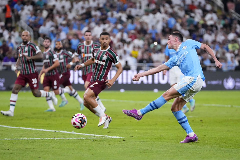 Manchester City's Phil Foden attempts a shot at goal during the Soccer Club World Cup final match between Manchester City FC and Fluminense FC at King Abdullah Sports City Stadium in Jeddah, Saudi Arabia, Friday, Dec. 22, 2023. (AP Photo/Manu Fernandez)