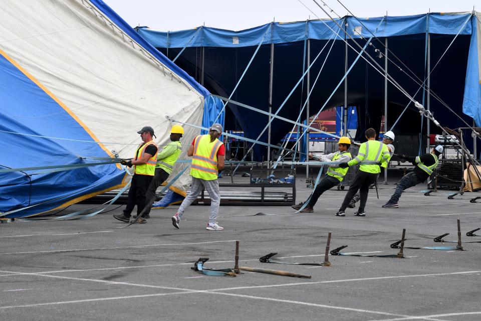 Members of Circus Vargas stretch out the tent roof as they assemble the big top at the Ventura County Fairgrounds on Wednesday as they prepare for performances over the Memorial Day weekend.