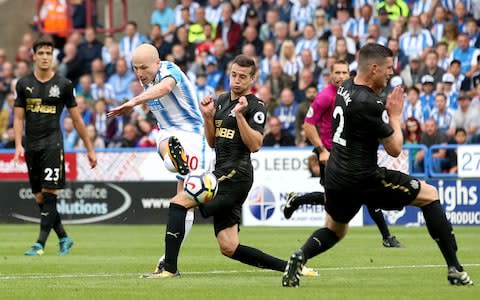 Aaron Mooy opens the scoring - Credit: GETTY IMAGES