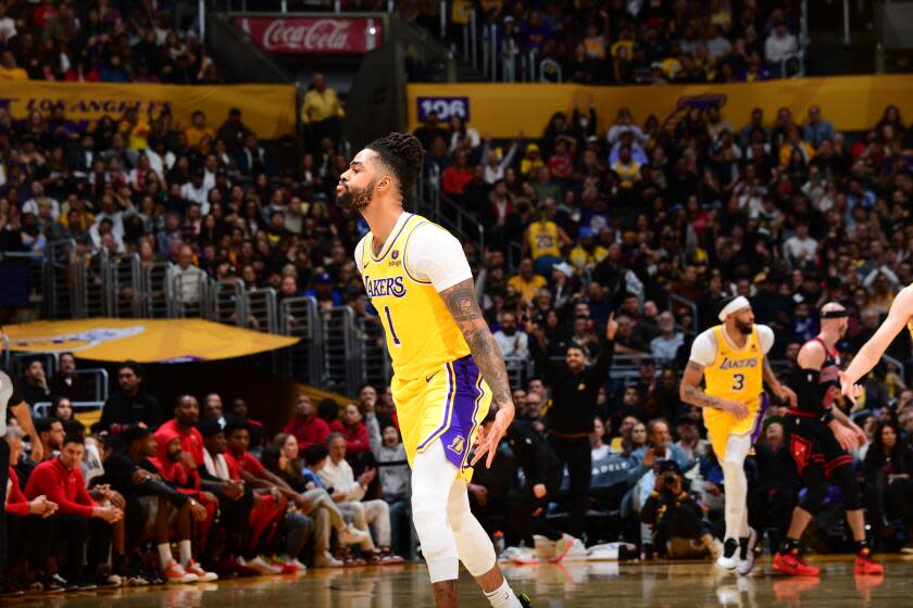 LOS ANGELES, CA - JANUARY 25: D'Angelo Russell #1 of the Los Angeles Lakers celebrates.