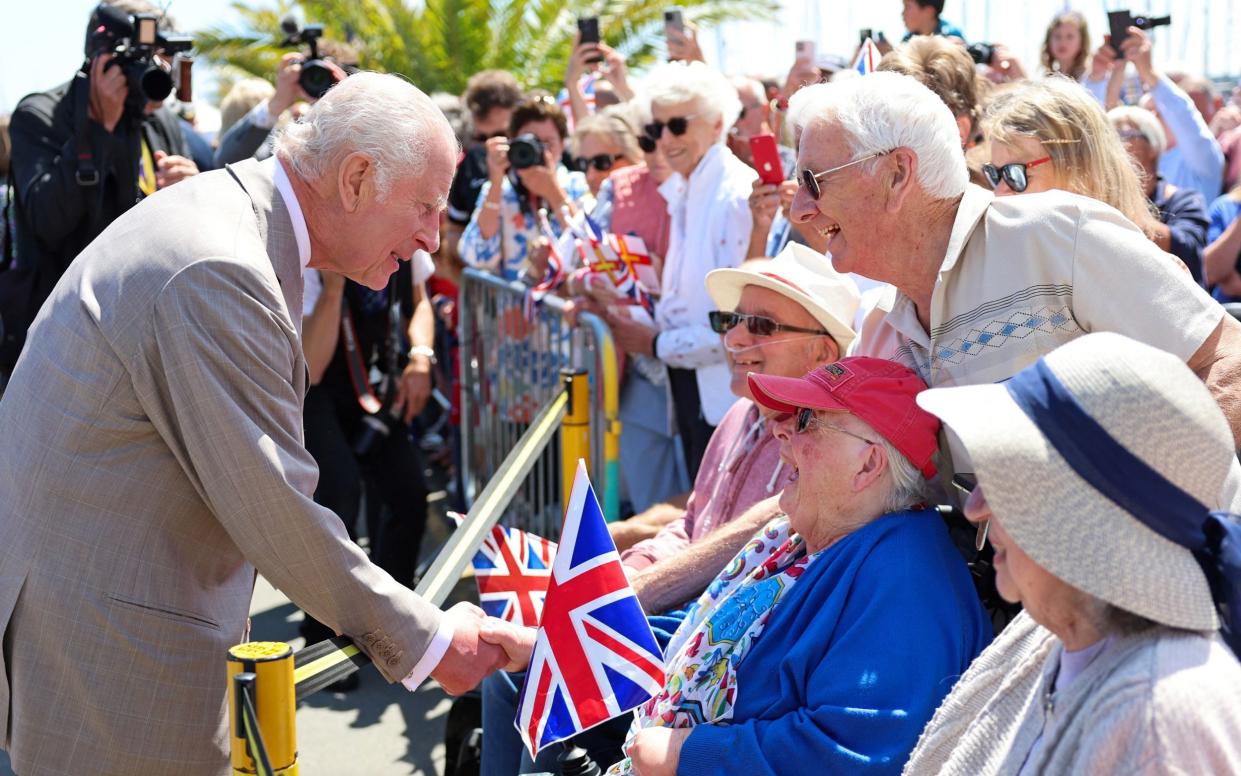 His Majesty greeted wellwishers who came out to meet him in St Peter Port