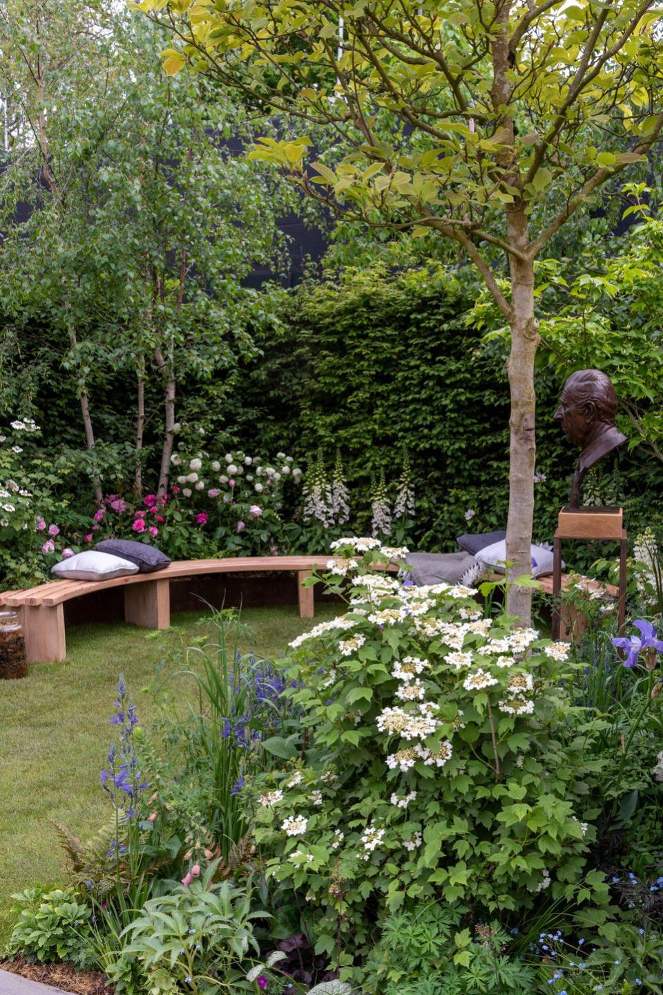 rhs garden of royal reflection and celebration designed by dave green feature garden rhs chelsea flower show 2023 stand no 111