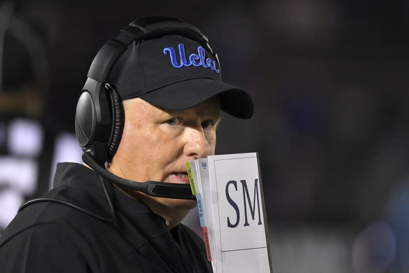 FILE - In this Nov. 30, 2019, file photo, UCLA head coach Chip Kelly stands on the sideline during the second half of an NCAA college football game against California in Pasadena, Calif. It's either now or never as Kelly enters his fourth season at UCLA. Kelly has one of the more experienced squads in the Pac-12 Conference with 19 starters returning. (AP Photo/Mark J. Terrill, File)