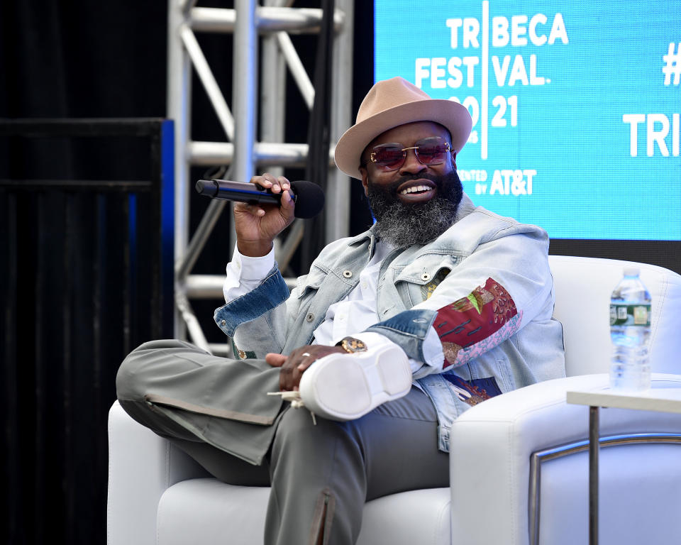 Black Thought Wearing Denim Jacket, Hat, And Sunglasses