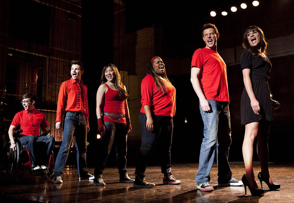 From left, Kevin McHale, Chris Colfer, Jenna Ushkowitz, Amber Riley, Cory Monteith and Lea Michele perform in a 2013 episode of 