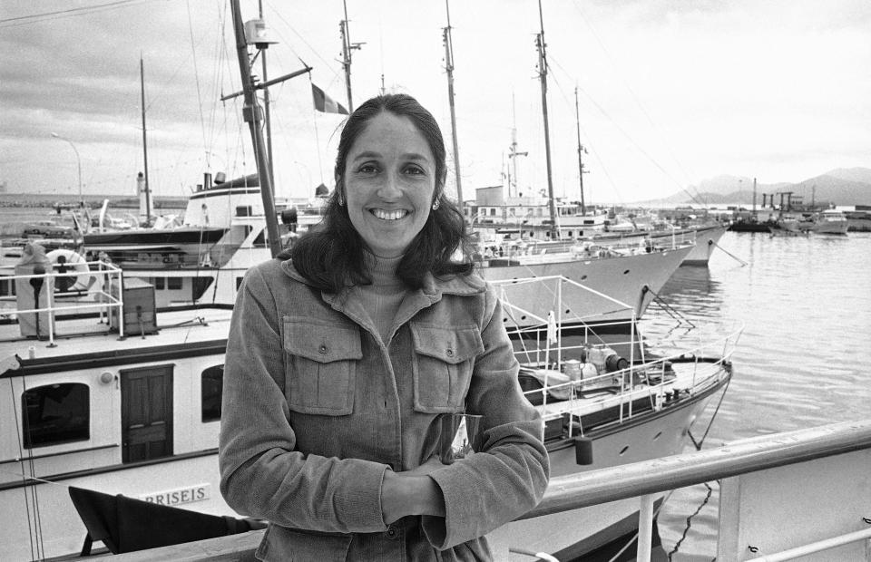 FILE - U.S. folk singer Joan Baez, who wrote the ballad for the Italian film "Sacco e Vanzetti", is pictured by Cannes harbor, France, May 27, 1971. Baez is the subject of a documentary titled, "Joan Baez: I Am a Noise." (AP Photo/Michel Lipchitz, File)