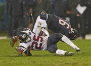 Jay Cutler #6 of the Chicago Bears is hit by Kareem Jackson #25 of the Houston Texans at Soldier Field on November 11, 2012 in Chicago, Illinois. The Texans defeated the Bears 13-6. (Photo by Jonathan Daniel/Getty Images)