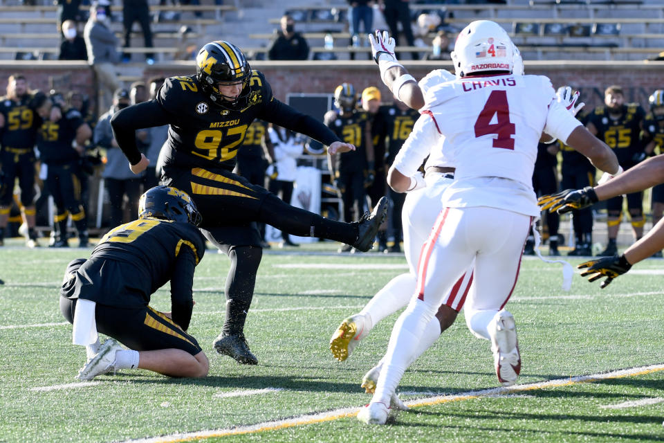 Missouri place kicker Harrison Mevis (92) kicks a 32-yard field goal to defeat Arkansas 50-48 on the final play of an NCAA college football game Saturday, Dec. 5, 2020, in Columbia, Mo. (AP Photo/L.G. Patterson)