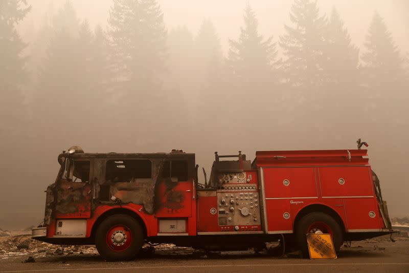 A fire damaged fire truck sits in the aftermath of the Beachie Creek fire in Detroit, Oregon