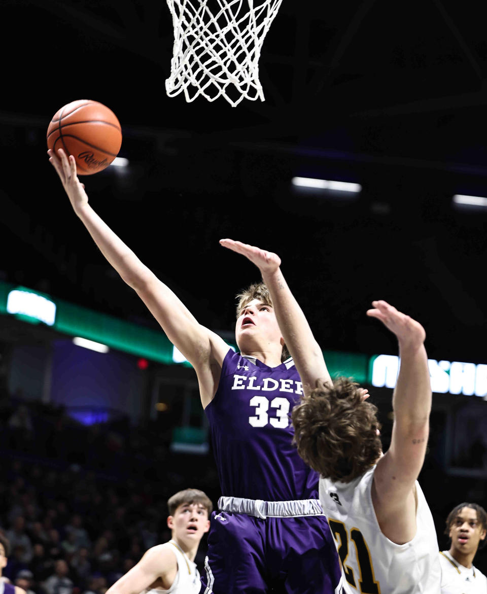 Elder's Tyler Johnson drives to the basket during the Panthers' 47-54 loss to Centerville in the regional semifinal at Cintas Center Wednesday, March 8, 2023.