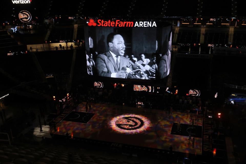 Jan 18, 2021; Atlanta, Georgia, USA; Dr. Martin Luther King is honored before a MLK day game between the Atlanta Hawks and the Minnesota Timberwolves on MLK Day at State Farm Arena. Mandatory Credit: Jason Getz-USA TODAY Sports