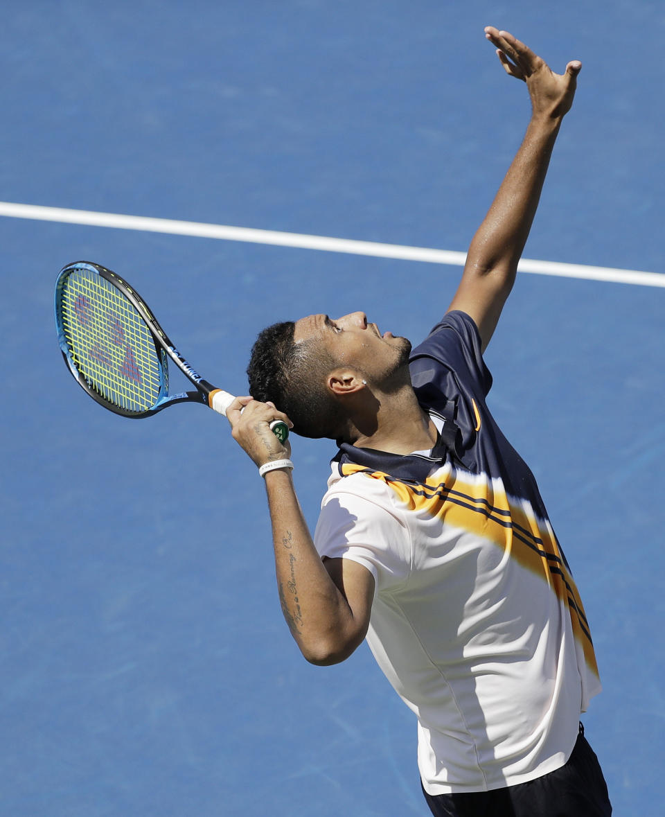 Nick Kyrgios, of Australia, serves to Pierre-Hugues Herbert, of France, during the second round of the U.S. Open tennis tournament, Thursday, Aug. 30, 2018, in New York. (AP Photo/Seth Wenig)