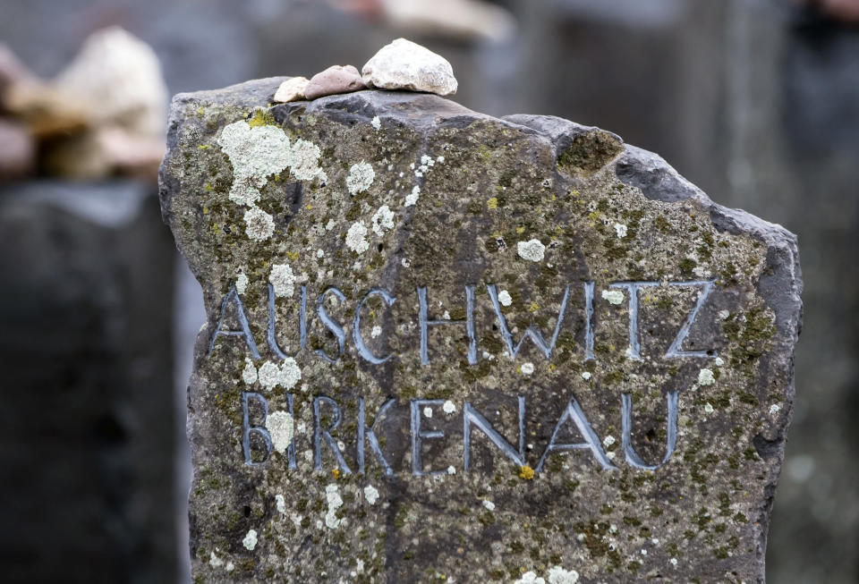 <p>Stones lie on a Auschwitz-Birkenau memorial stone on occasion of the international Holocaust remembrance day in the former Nazi concentration camp Buchenwald near Weimar, Germany, Friday, Jan. 26, 2018. (Photo: Czarek Sokolowski/AP) </p>