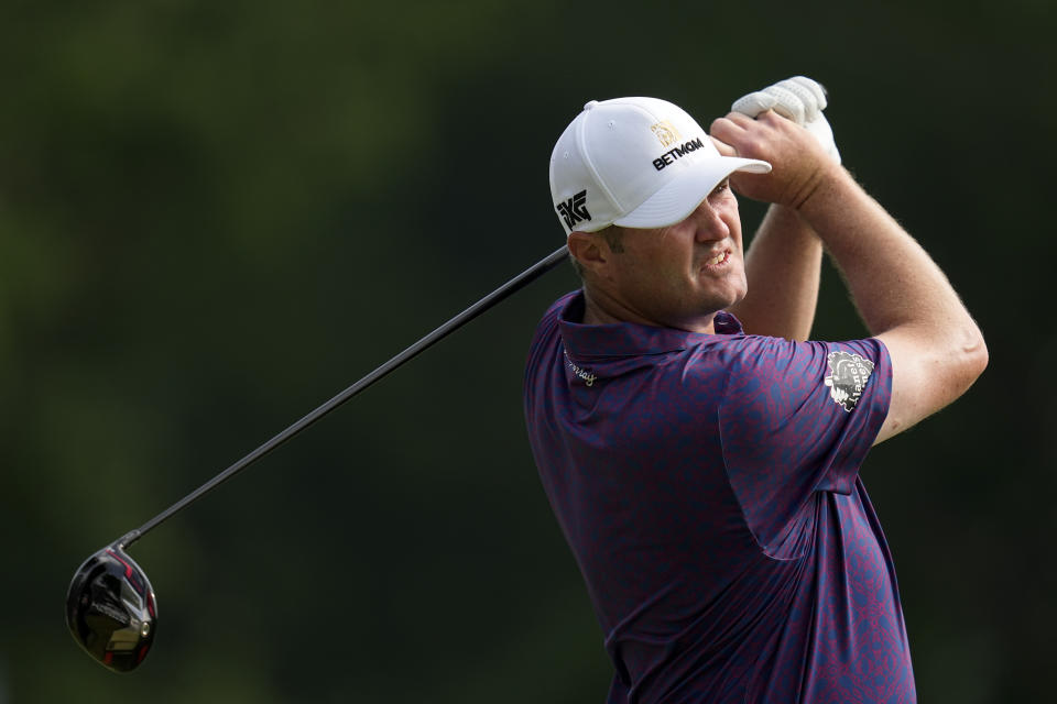 Jason Kokrak watches his tee shot on the ninth hole during the second round of the PGA Championship golf tournament at Southern Hills Country Club, Friday, May 20, 2022, in Tulsa, Okla. (AP Photo/Sue Ogrocki)