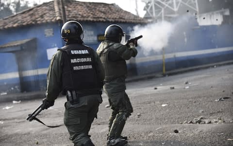 Venezuelan forces fired buckshot in the border town of Ureña - Credit: Carlos Becerra/Bloomberg