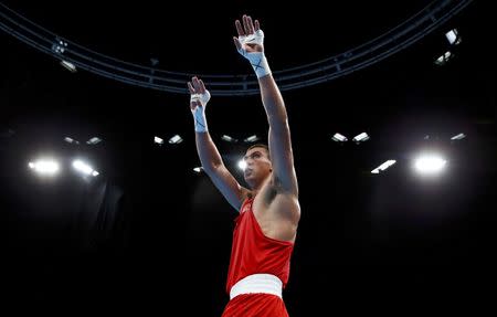 2016 Rio Olympics - Boxing - Semifinal - Men's Heavy (91kg) Semifinals Bout 158 - Riocentro - Pavilion 6 - Rio de Janeiro, Brazil - 13/08/2016. Evgeny Tishchenko (RUS) of Russia reacts after his bout. REUTERS/Peter Cziborra