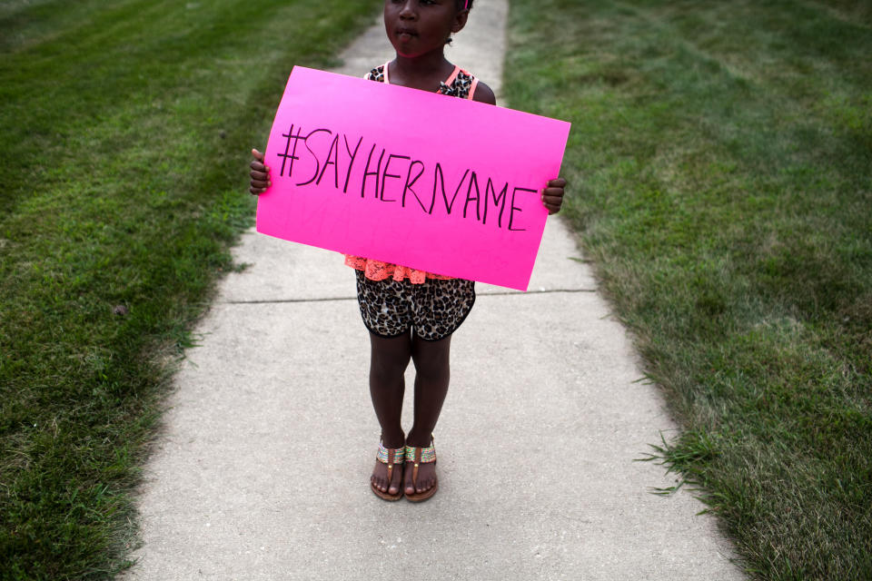 Daija Belcher, 5, holds a sign in front of the DuPage African Methodist Episcopal Church during the funeral service for Sandra Bland on July 25, 2015, in Lisle, Illinois. (Photo: Jonathan Gibby via Getty Images)