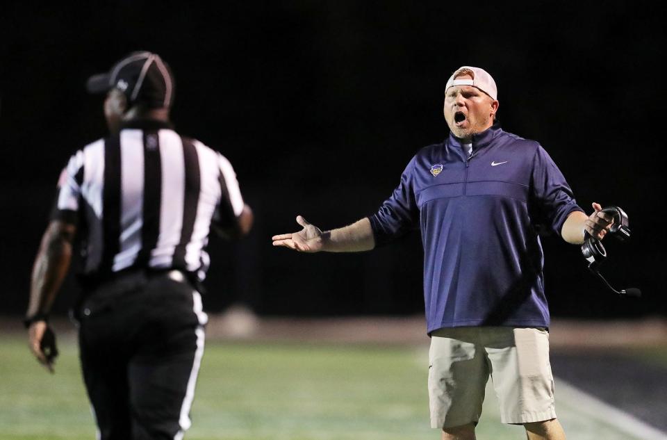 Tallmadge football coach Mike Hay reacts to a second-half penalty at Green on Sept. 2, 2022.