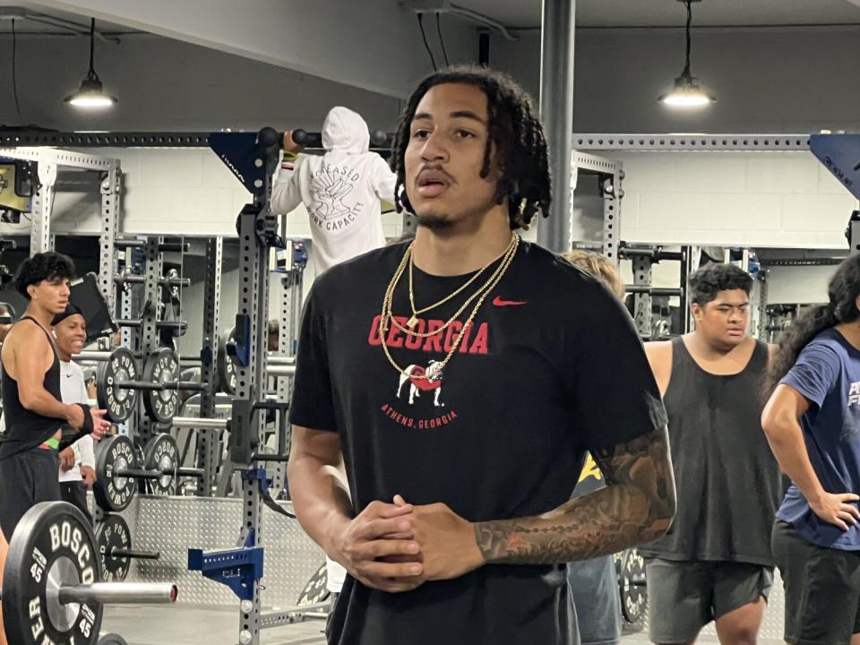 St. John Bosco safety Peyton Woodyard poses for a photo in the team's weight room.