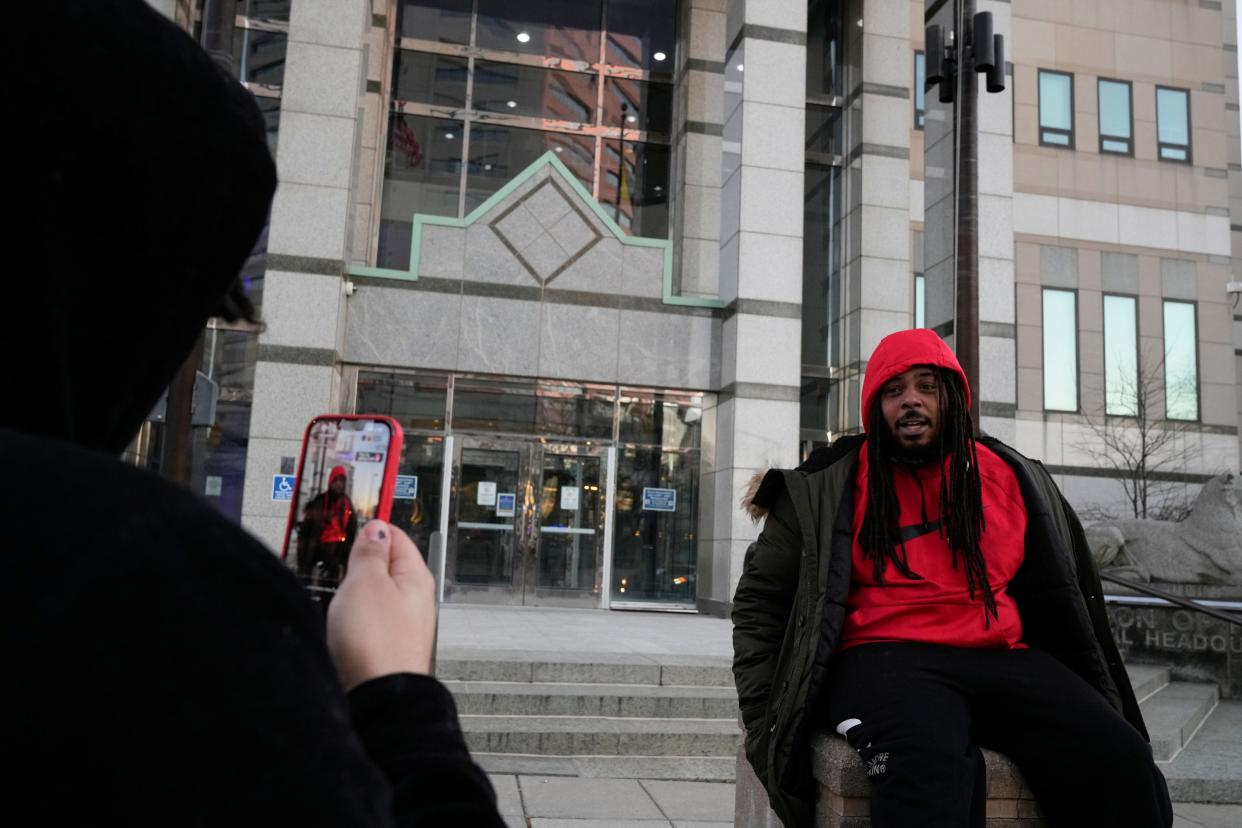 Dejuan Sharp, president of local activism group Downtowners, talks while being livestreamed during a protest Saturday outside Columbus Police Headquarters for Sinzae Reed, 13, who was shot and killed Oct. 12.