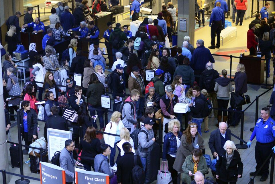 Passengers line up to head through security at the Pittsburgh International Airport (PIT) in Findlay Twp. in 2017.