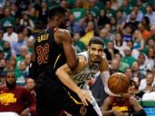 May 23, 2018; Boston, MA, USA; Boston Celtics forward Jayson Tatum (0) drives against Cleveland Cavaliers forward Jeff Green (32) during the third quarter of game five of the Eastern conference finals of the 2018 NBA Playoffs at TD Garden. Mandatory Credit: Greg M. Cooper-USA TODAY Sports