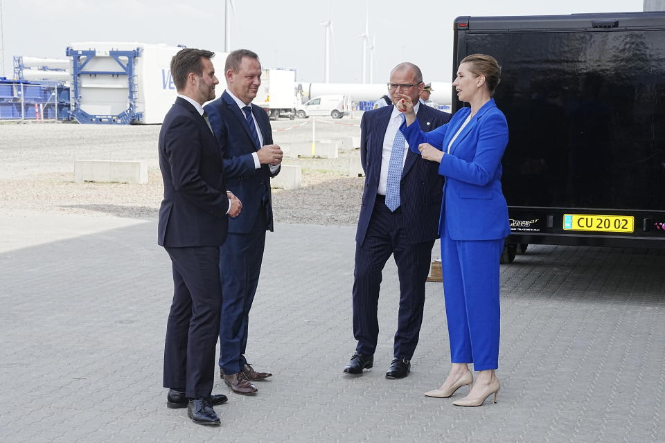 Danish prime minister Mette Frederiksen arrives at a press conference together with German chancellor Olaf Scholz at the Port of Esbjerg, Denmark, on Wednesday, May 18, 2022. Four European Union countries plan to build North Sea wind farms capable of producing at least 150 gigawatts of energy by 2050 to help cut carbon emissions that cause climate change, Danish media reported Wednesday. Under the plan, wind turbines would be raised off the coasts of Belgium, the Netherlands, Germany and Denmark, daily Danish newspaper Jyllands-Posten said. (Bo Amstrup/Ritzau Scanpix via AP)