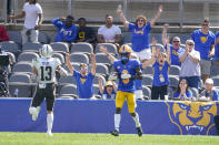 Fans cheer after Pittsburgh wide receiver Jordan Addison (3) made a catch for a touchdown past Western Michigan linebacker Harrison Taylor (13) during the first half of an NCAA college football game, Saturday, Sept. 18, 2021, in Pittsburgh. (AP Photo/Keith Srakocic)