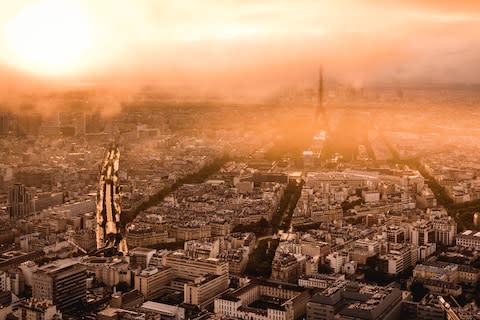 March: A copper haze hangs over Paris at dusk - Credit: Walner Espinoza Bares