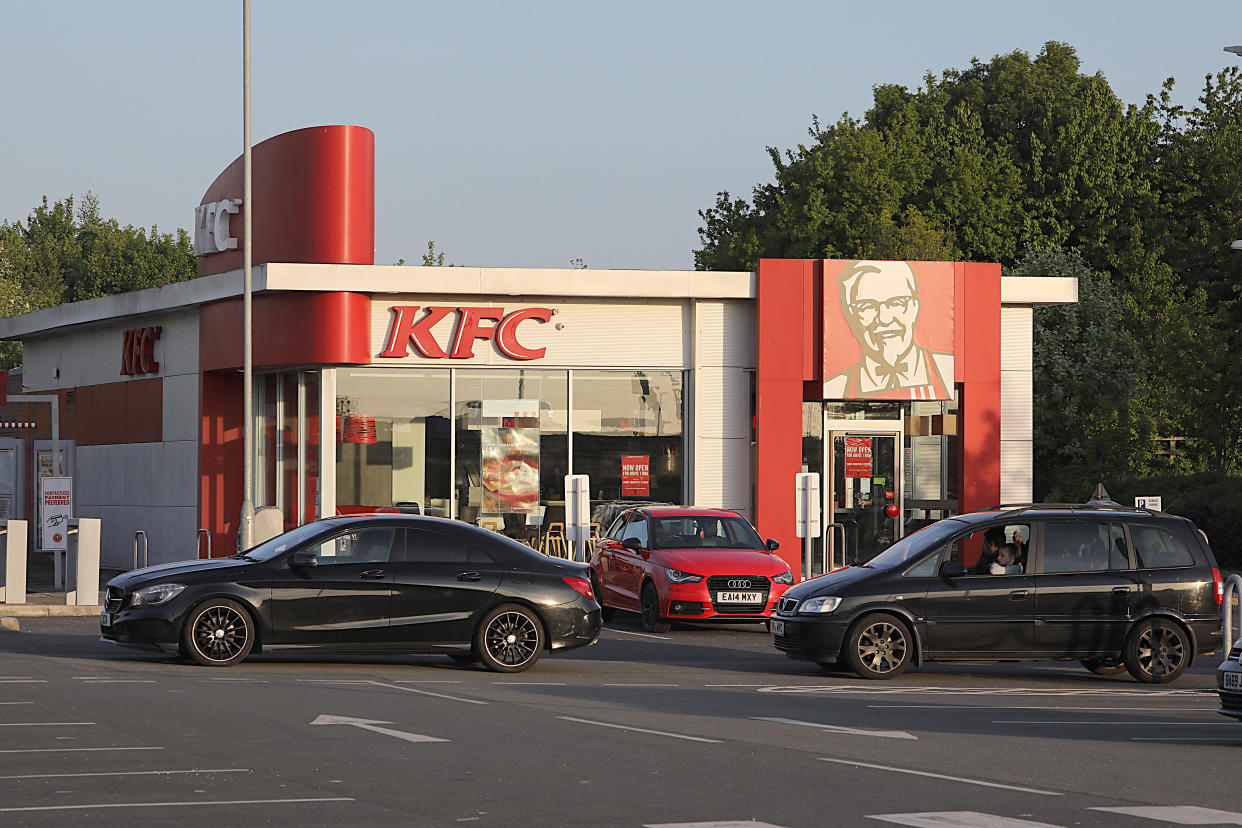 Huge queues lasting up to two hours formed after a KFC drive-thru reopened unexpectedly in Rhuddlan, north Wales (Picture: Wales News)