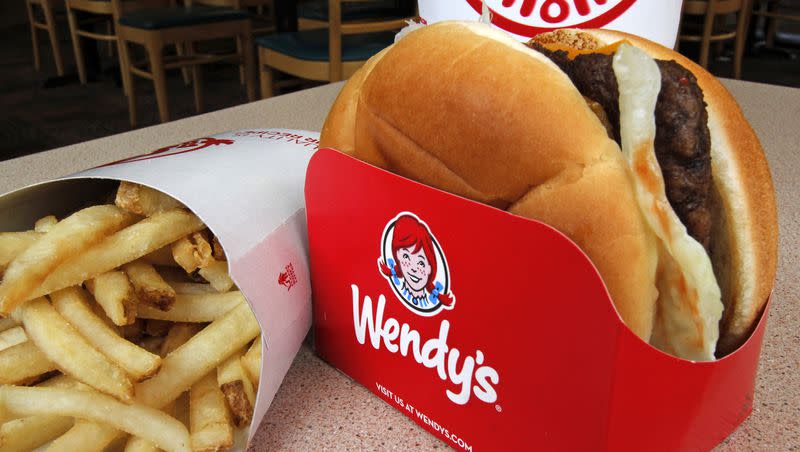 A Wendy’s single with cheese large combo meal at a Wendy’s restaurant in Mt. Lebanon, Pennsylvania. Wendy’s is offering jr. bacon cheeseburgers for a penny this week in honor of National Bacon Day on Dec. 30. 