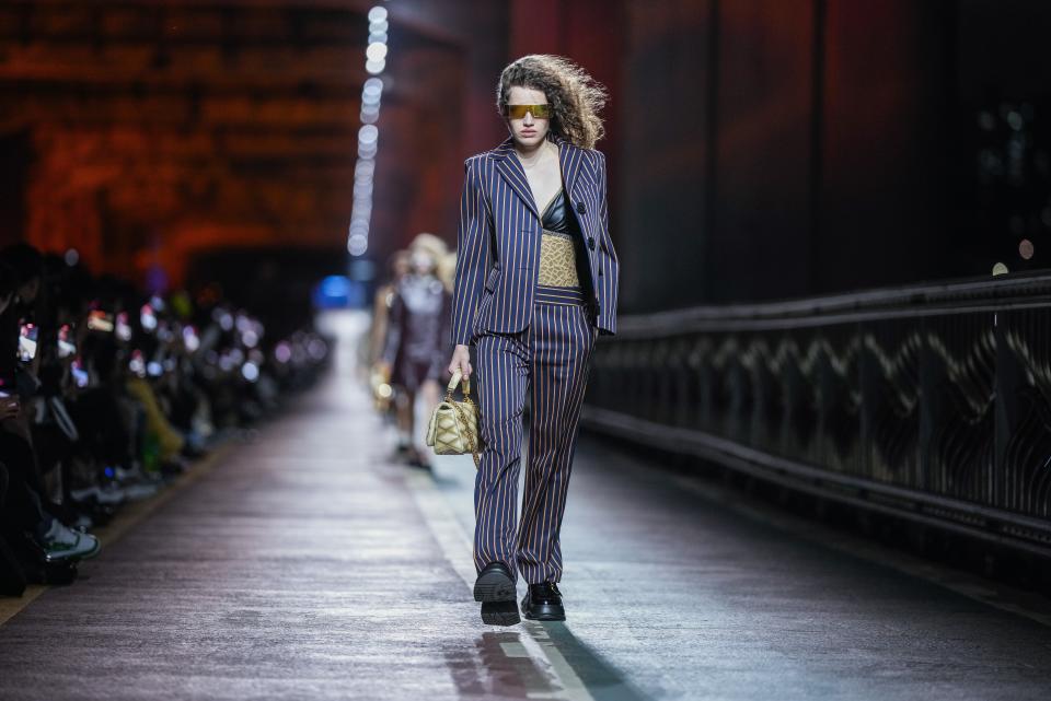 A model wears a creation for the Louis Vuitton Pre-Fall 2023 show in Seoul, South Korea, Saturday, April 29, 2023. (AP Photo/Lee Jin-man)